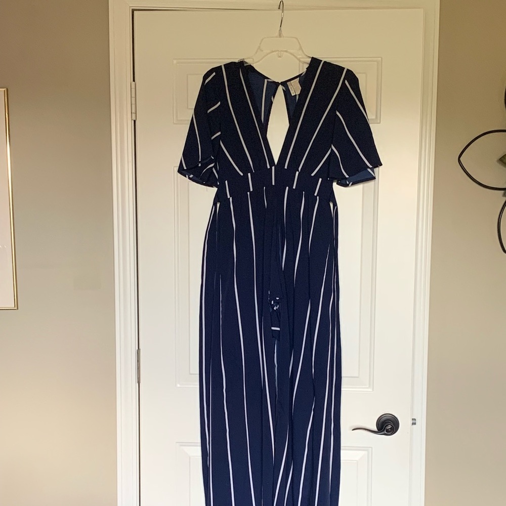 Navy blue and white romper with train